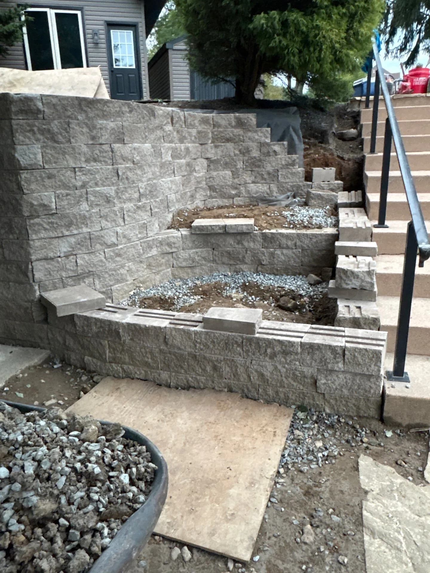 Tiered Retaining Wall Taking Shape Block by Block