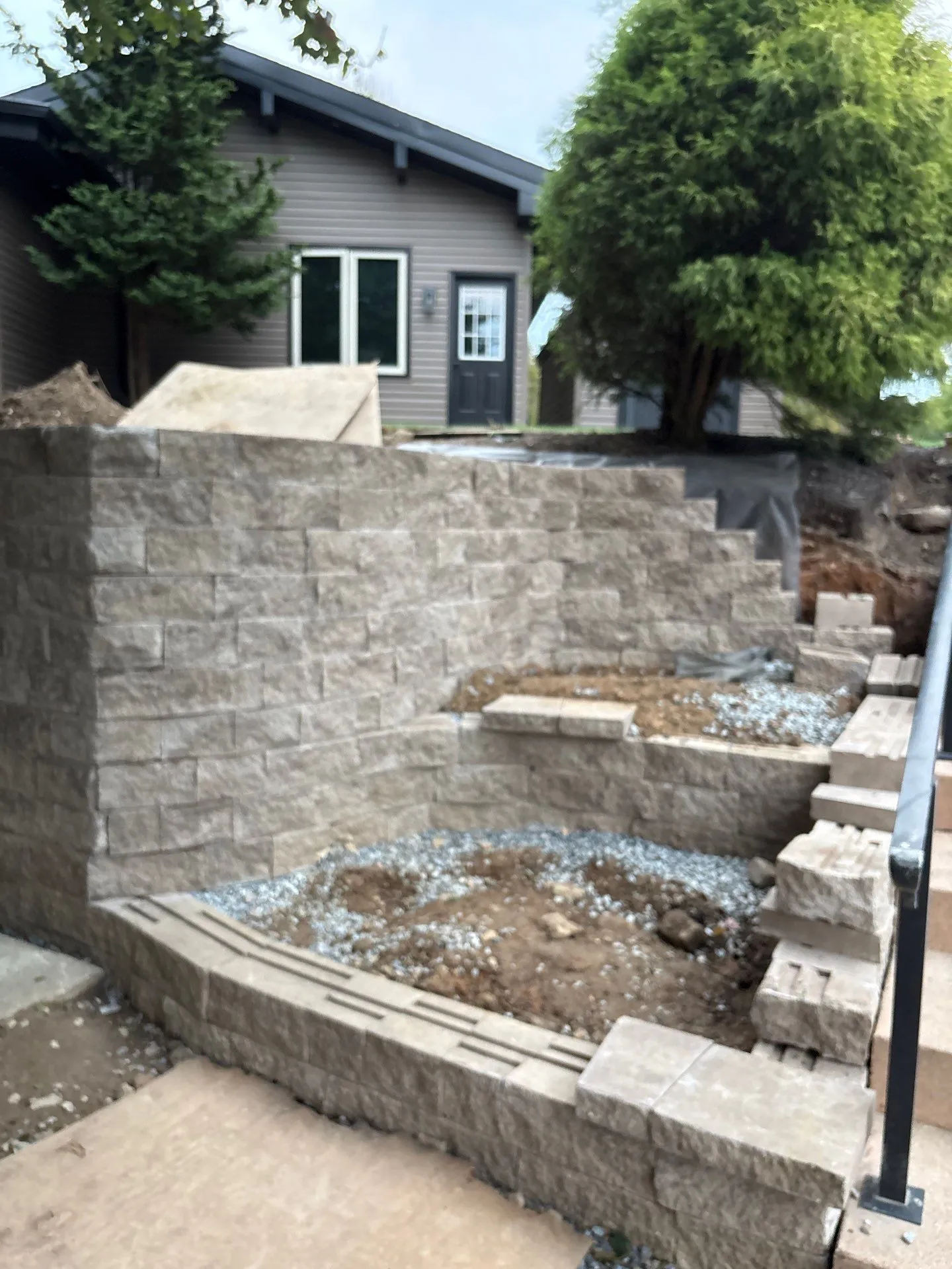 Gallery photos for Tiered Retaining Wall Taking Shape Block by Block: Image #1