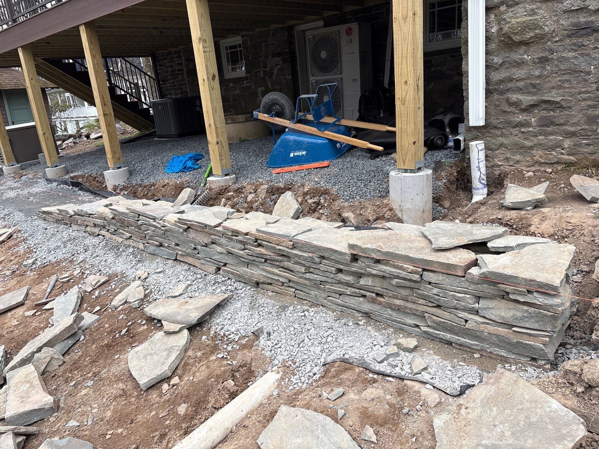 Dry Stacked Stone Wall Taking Shape Piece by Piece image
