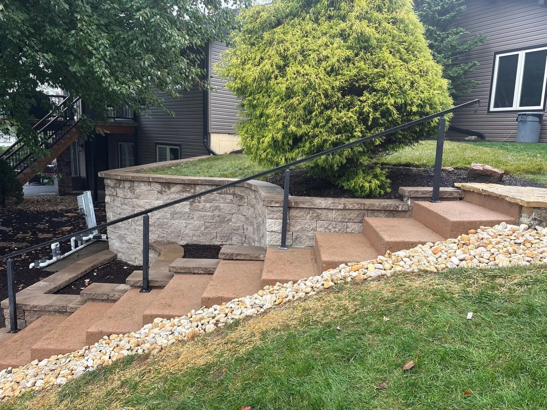 Gallery photos for Block Wall Replacement with Tiered Beds and Fresh Mulch: Image #1